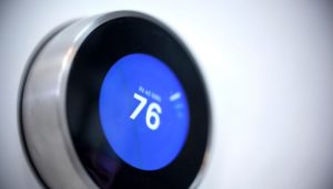 a google nest showing 76 degrees Fahrenheit with tips to help keep a room even temp